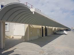 تركيب طبيلات في قطر | مظلات سيارات حديثة ومقاومة للحرارة - تطبيق عامل تكنولوجي